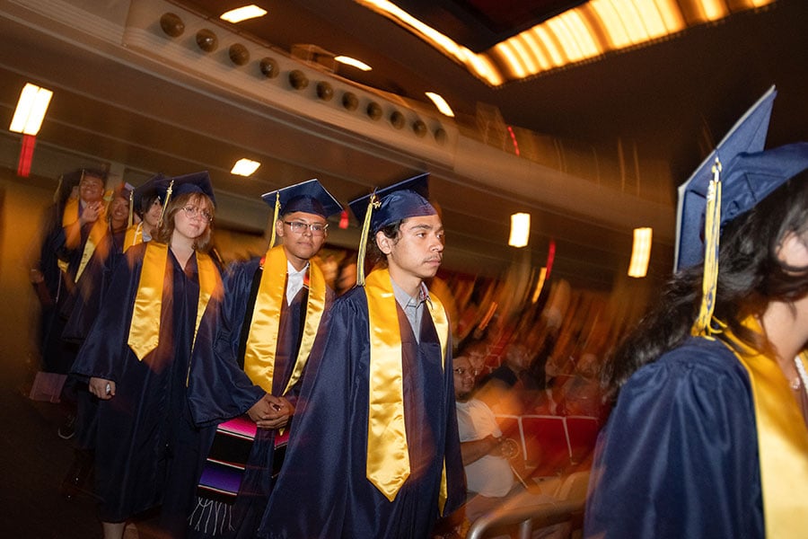 Graduates are introduced as they enter the Cristo Rey Fort Worth College Prep commencement ceremony, on Saturday, June 04, 2022 at Will Rogers Auditorium in Fort Worth.